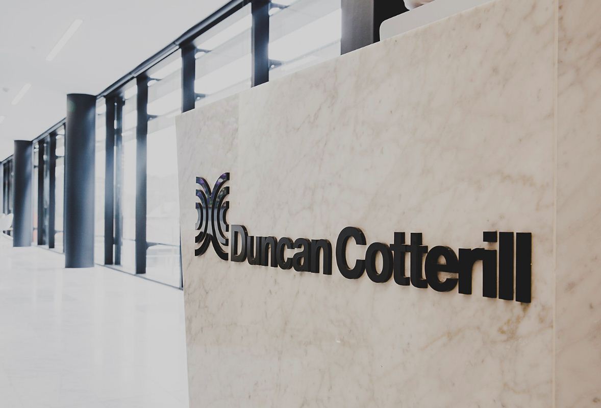 Duncan-Cotterill-Logo-at-reception-Low-Res-_5266593_1_0