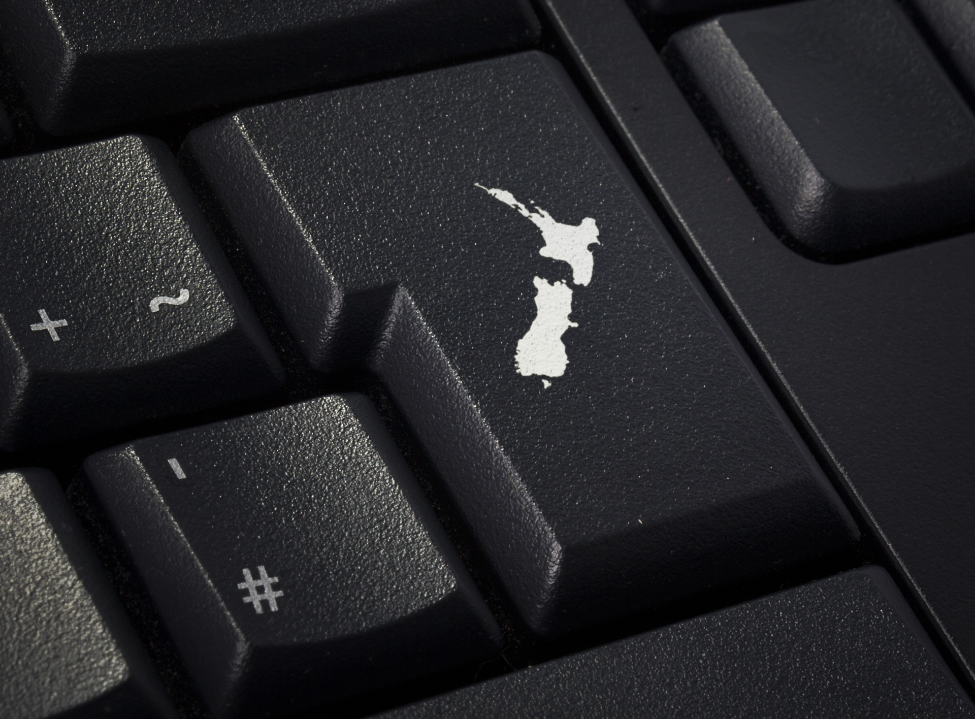 Keyboard with return key in the shape of New Zealand.(series)
