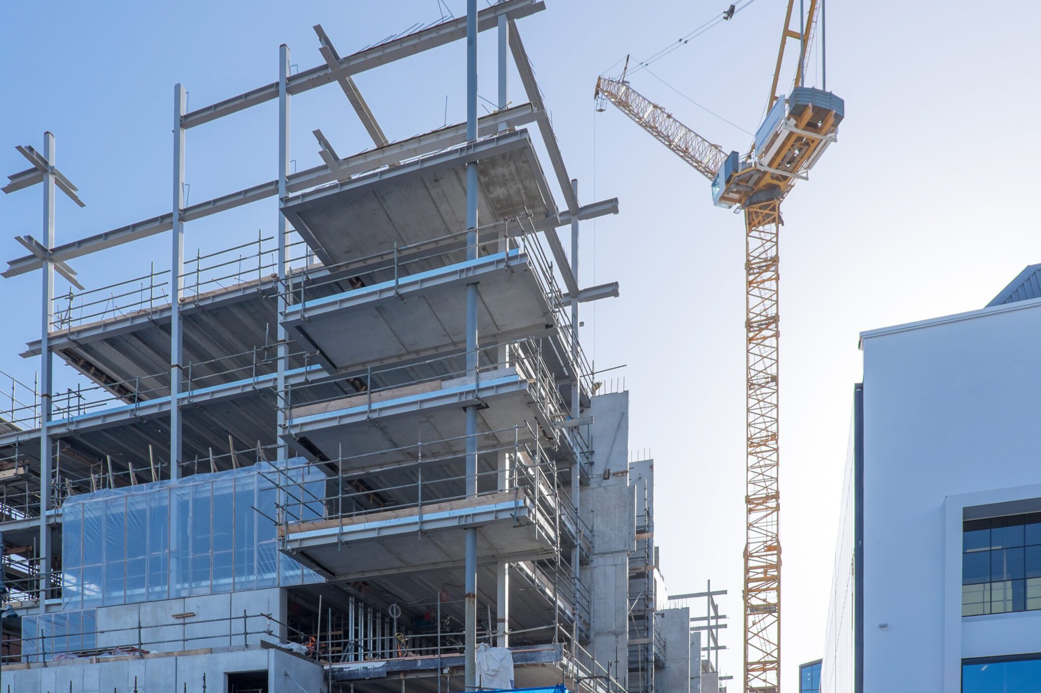 Building construction site with a crane in Auckland, New Zealand, NZ