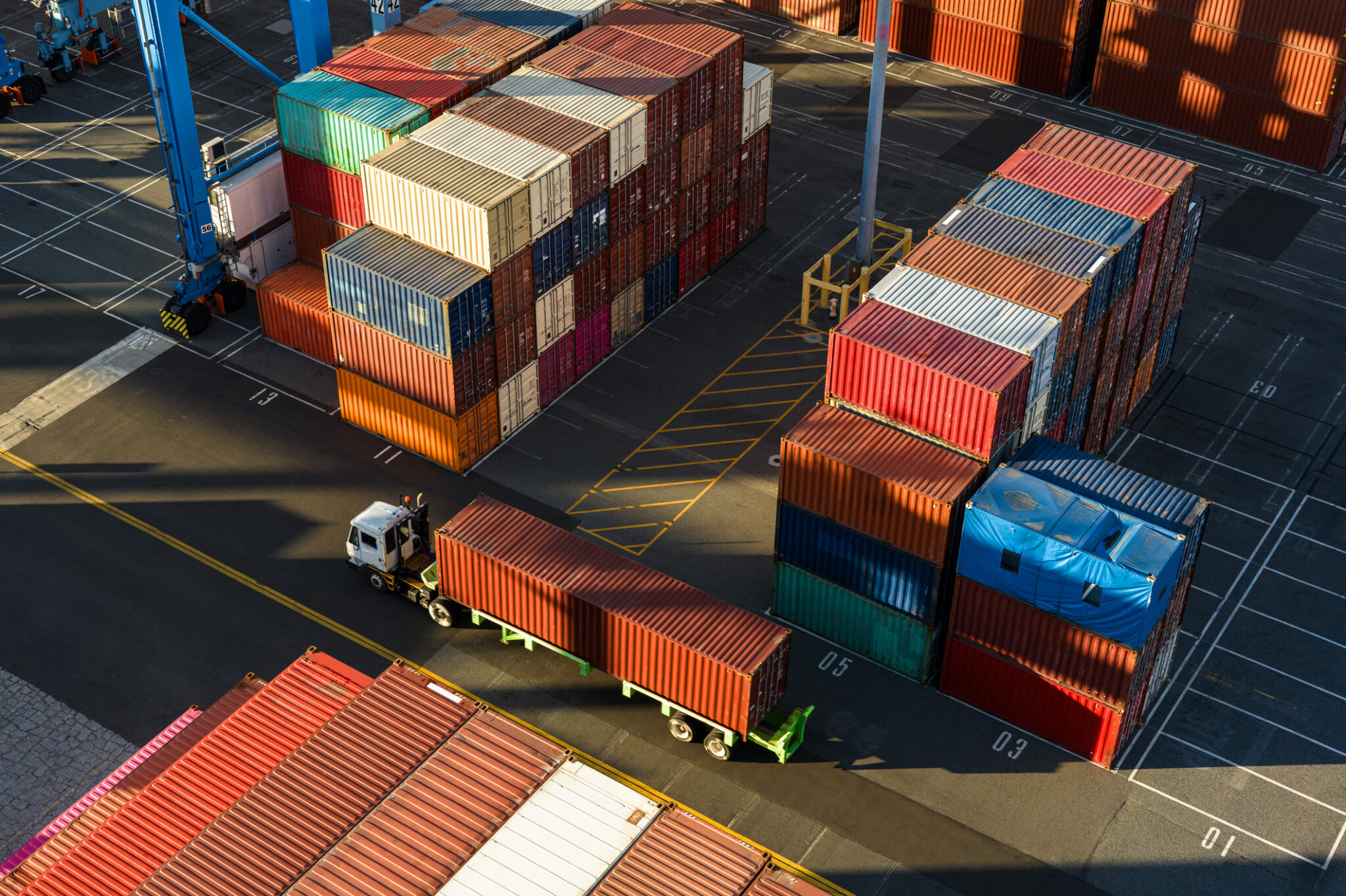 High Angle Drone Shot of Truck in Container Terminal